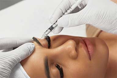 Lady receiving a cosmetic injectable treatment